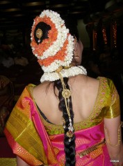 A bride adorned with flowers